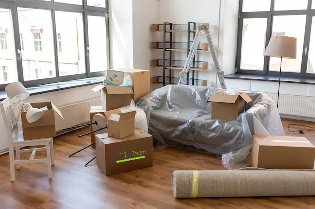 A friendly customer service representative from The Moving Team confirming the final details for a house move in Auckland over the phone.