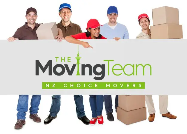 The professional The Moving Team and friendly crew of The Moving Team, Auckland's trusted moving company, smiling in front of their truck.