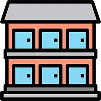 An expert apartment mover navigating a narrow hallway during a small move in an Auckland apartment building.