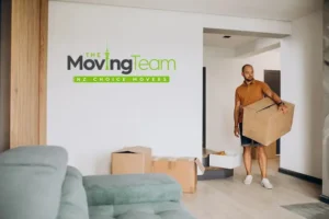 Person reviewing factors affecting apartment moving cost in Auckland, considering high-rise and access challenges