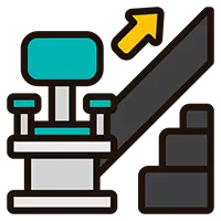 Two expert movers carefully carrying an armchair up a staircase, demonstrating their skill as lift and stair movers in Auckland.