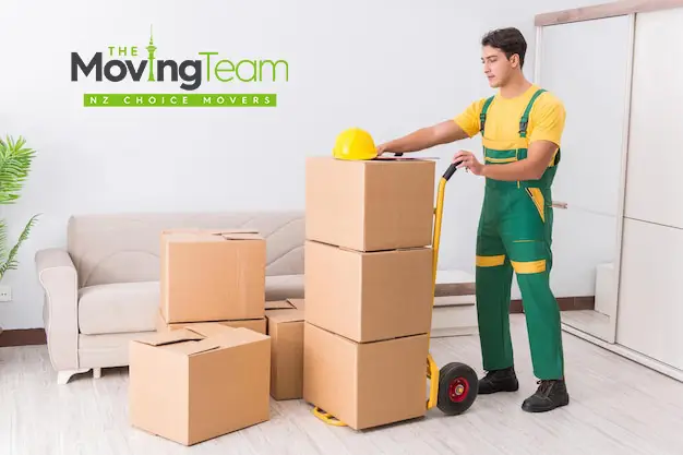 A professional junk removal truck loading unwanted items after a major decluttering effort in Auckland.