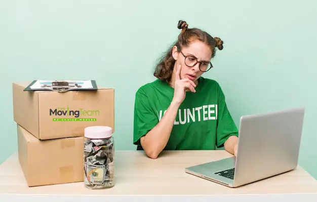 small move cost Auckland, Person saving money in a piggy bank while planning the budget for a small move cost in Auckland using a man with a van service.