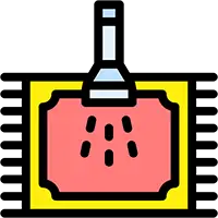 Technician using a steam cleaner on a living room carpet to remove deep stains.