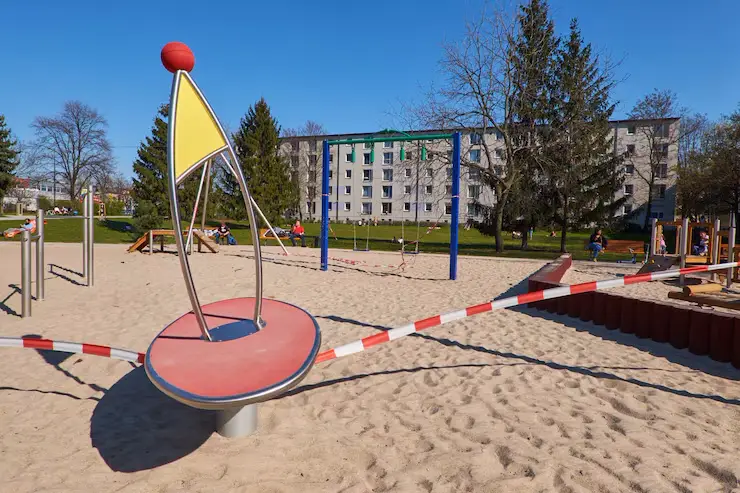 Parents evaluating brochures and academic records from the highest rated schools North Shore Auckland has to offer.